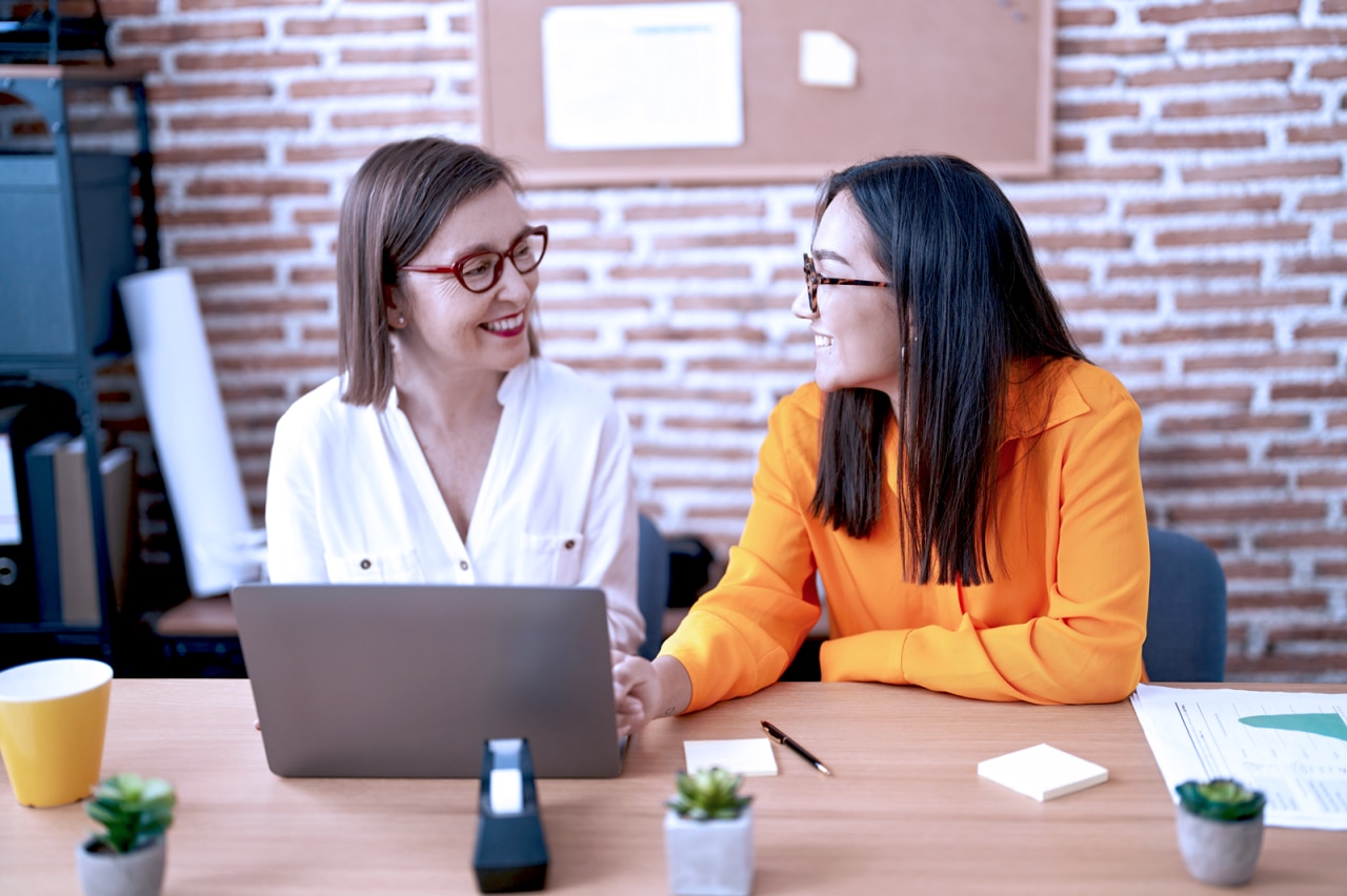 Two women in front of the computer