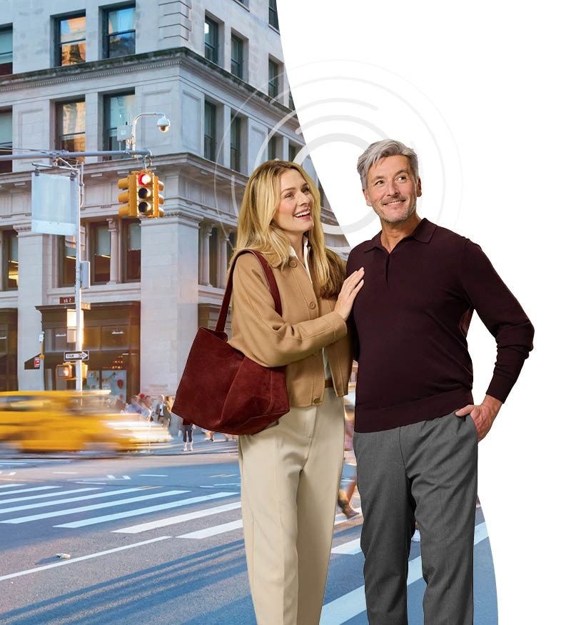 Couple walking and talking in a big city