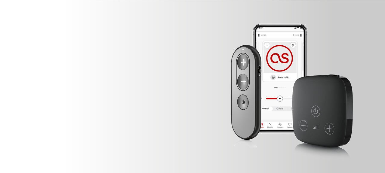 Wireless hearing aid accessories including TV Connector, app, and PartnerMic