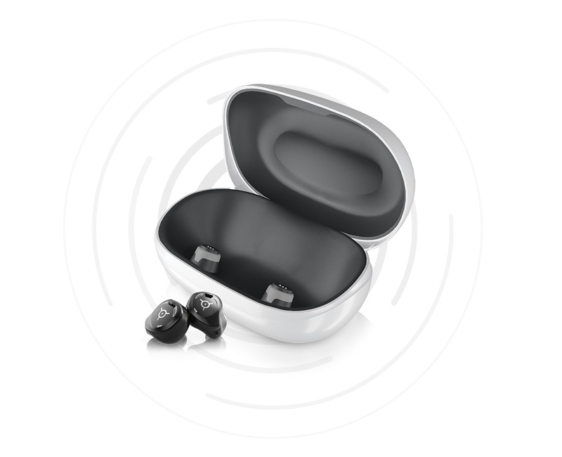 Pair of rechargeable and wireless in-the-ear hearing aids with charger